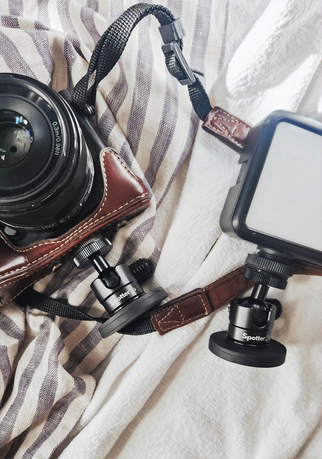 Spotter Pocket Mount packed beside a camera